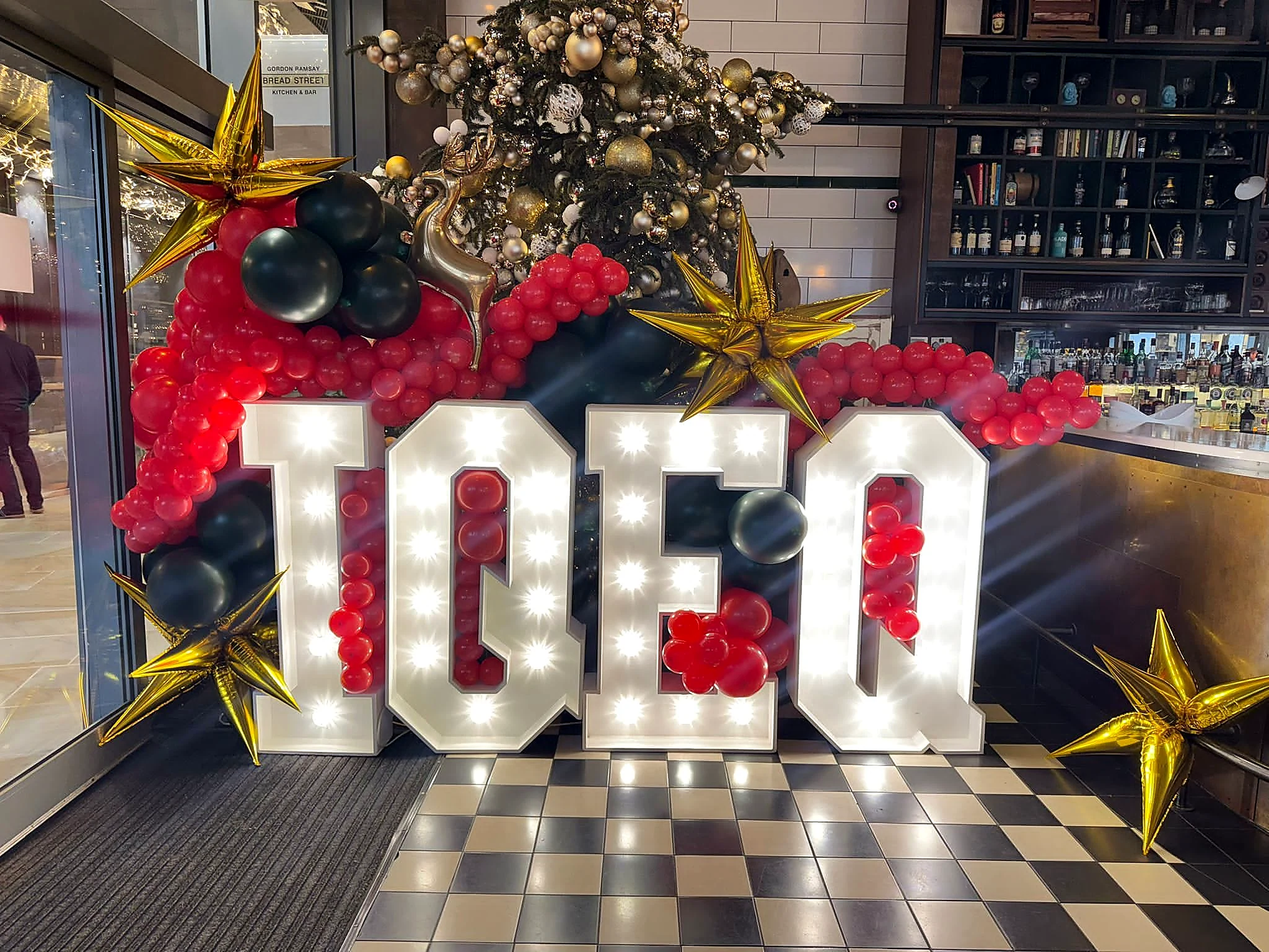 100 illuminated milestone numbers with balloon styling
