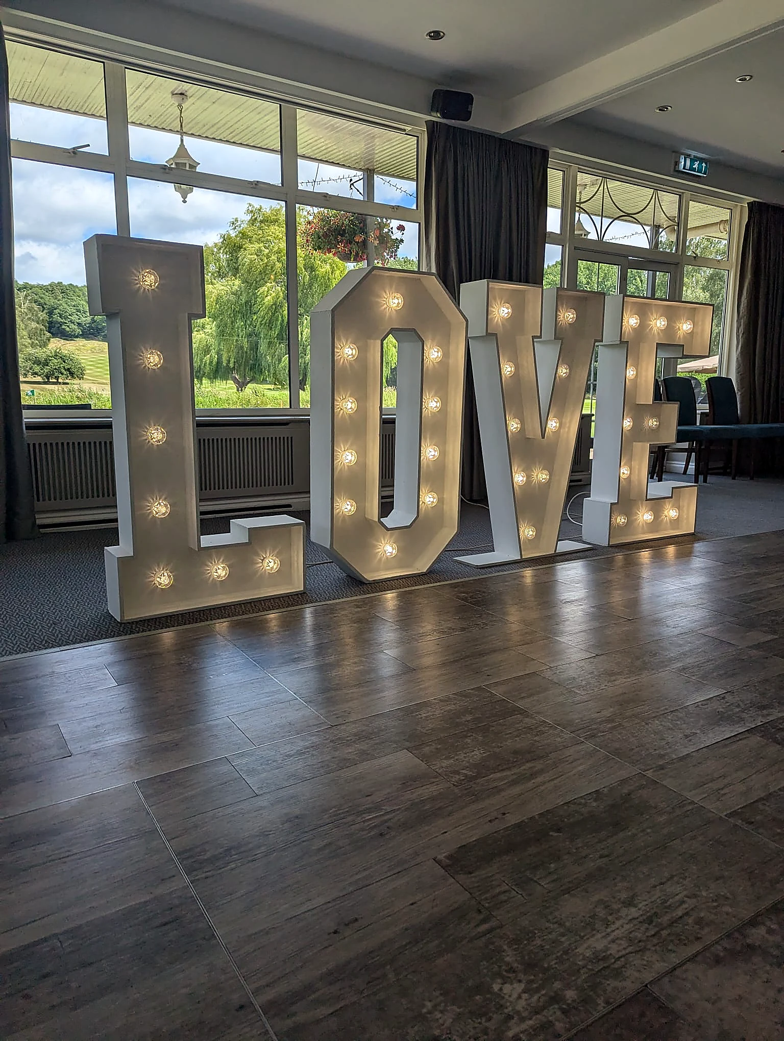 LOVE illuminated letters at an event venue